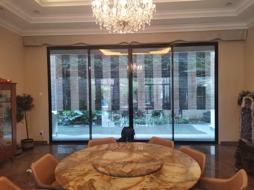 EZZO sliding door installation in residential dining room